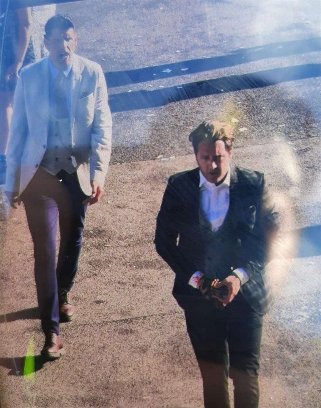 Police are seeking these two men in connection with an assault at Newbury Racecourse last month. (51635777)