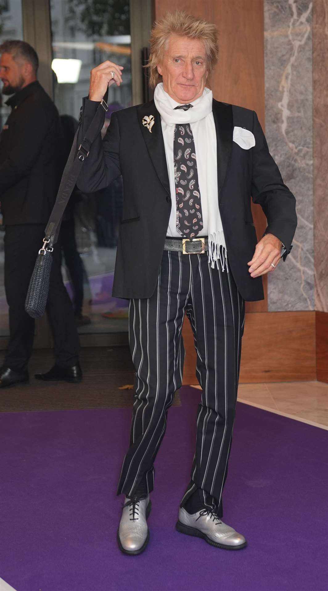 Sir Rod Stewart is performing the legends slot at Glastonbury Festival (Yui Mok/PA)