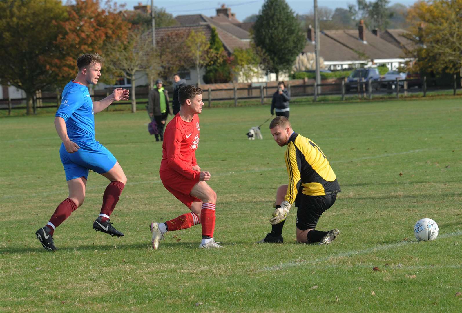 A Bucklebury player scores against Cottage Inn