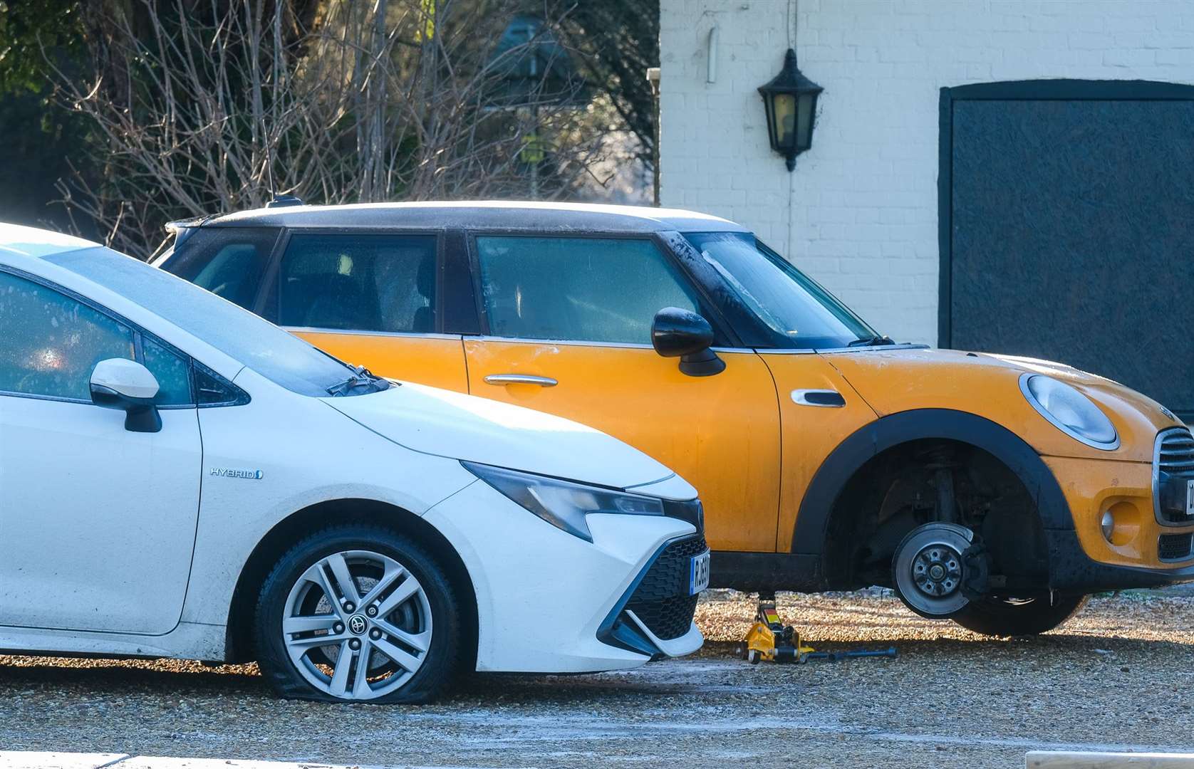 Two victims of the pothole that had to be parked in The Pheasant's car park overnight
