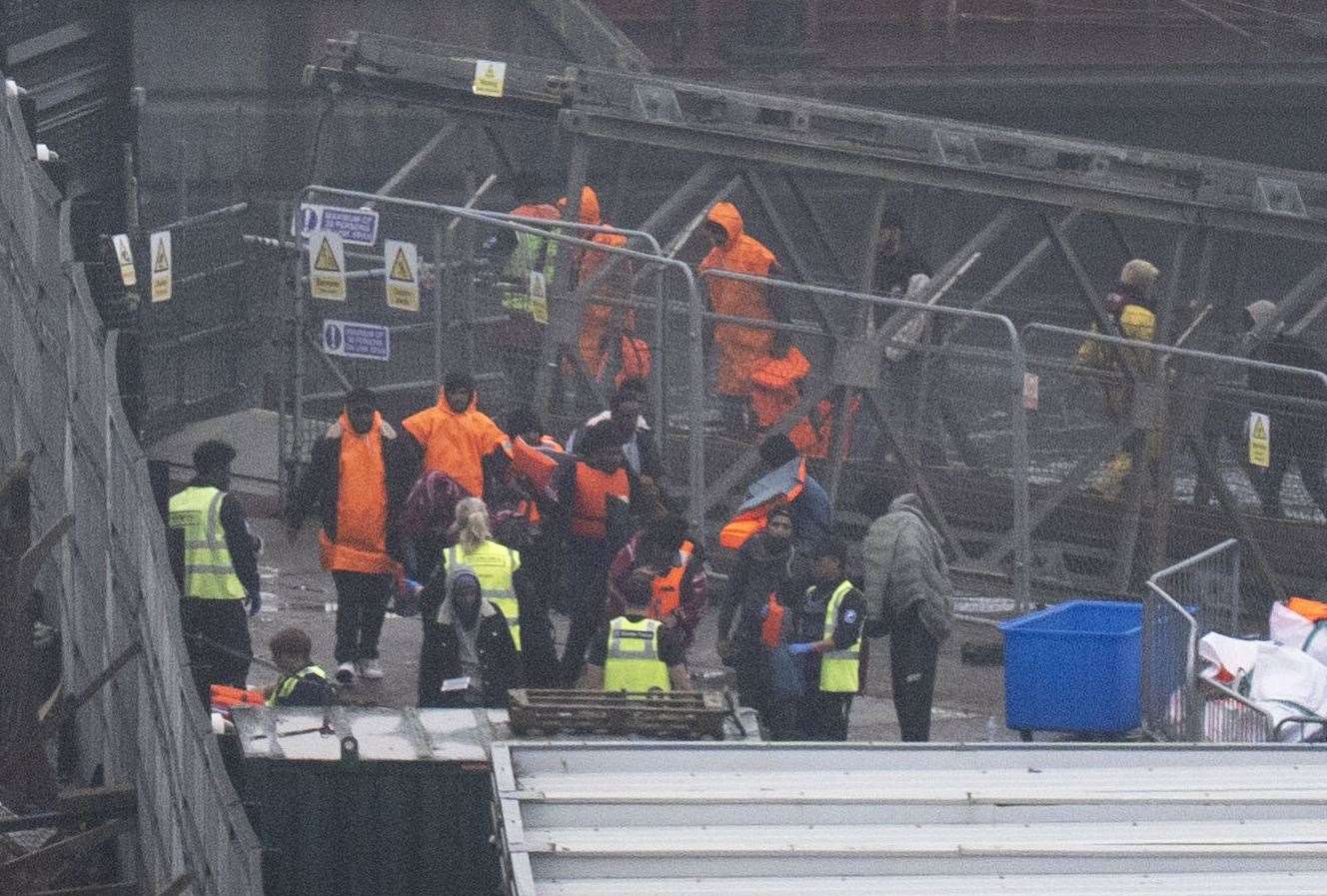A group of people thought to be migrants are brought in to Dover, Kent, from an RNLI Lifeboat following a small boat incident in the Channel (Gareth Fuller/PA)