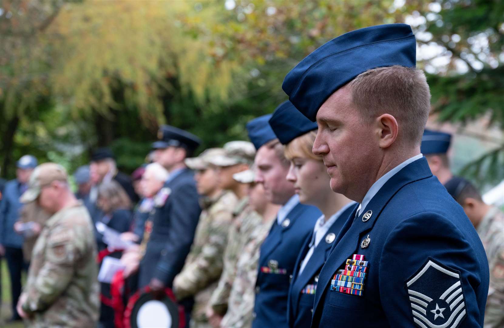 Service personnel pay their respects at RAF Welford Remembrance service. Credit: Adam Enbal / USAF