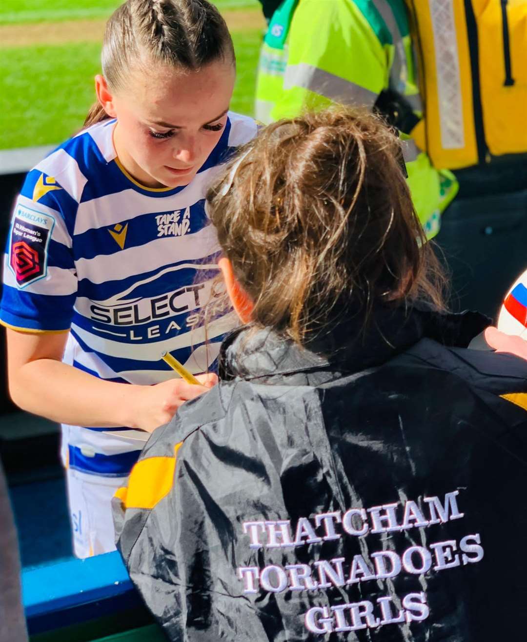 Reading FC’s Emma Harries signing autographs for the girls Picture: Jon Berry