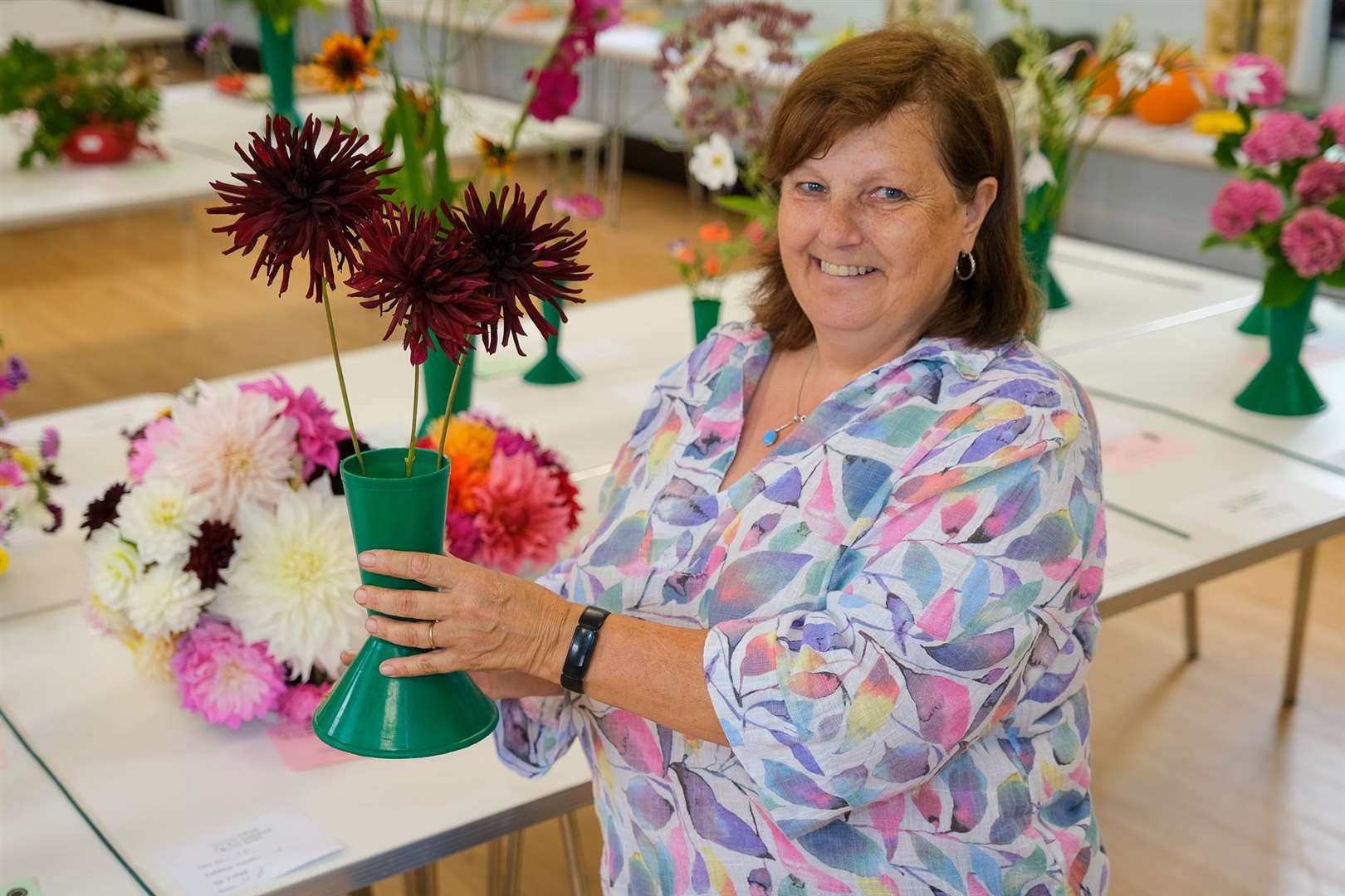 Jane Geater with winning Dahlias - Cactus type. Picture by Phil Cannings