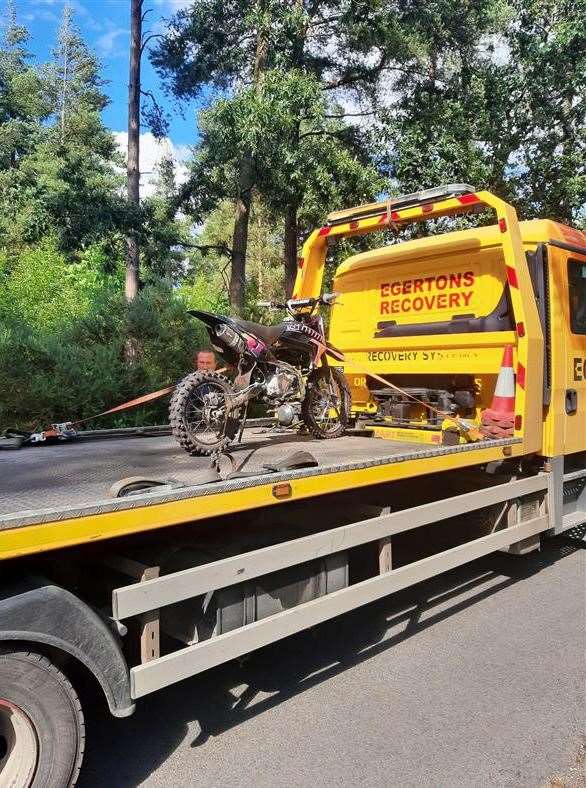 Thames Valley Police seized an off-road bike as part of its Operation Trail initiative, following reports it was being ridden in Longmoor Lane woods in Mortimer Common Picture: Thames Valley Police