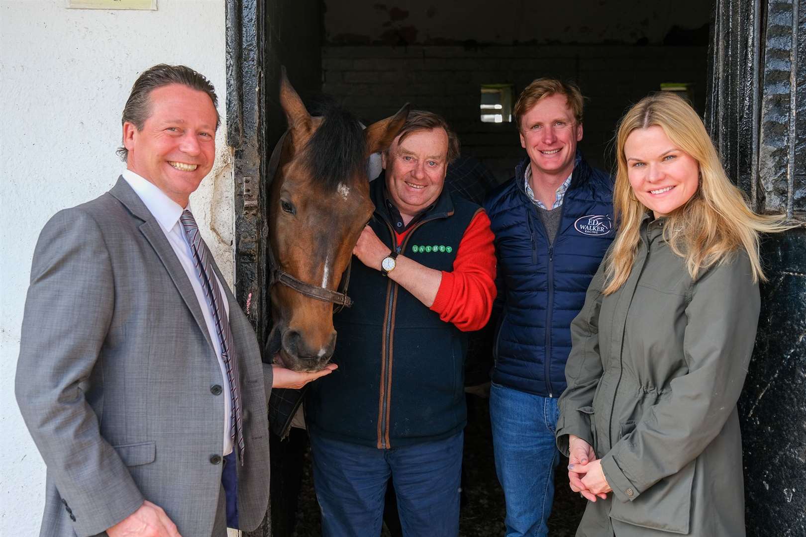 Sports Minister Nigel Huddleston visits Nicky Hendersons Yard in Lambourn Sports Minister Nigel Huddleston, Nicky Henderson, Ed Walker Trainer and Laura Farris (55921240)