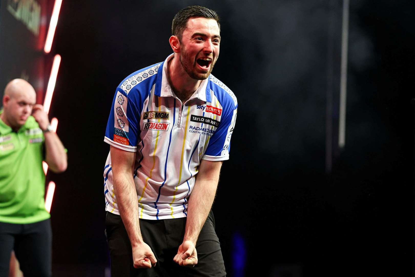 Luke Humphries celebrates his win in Leeds