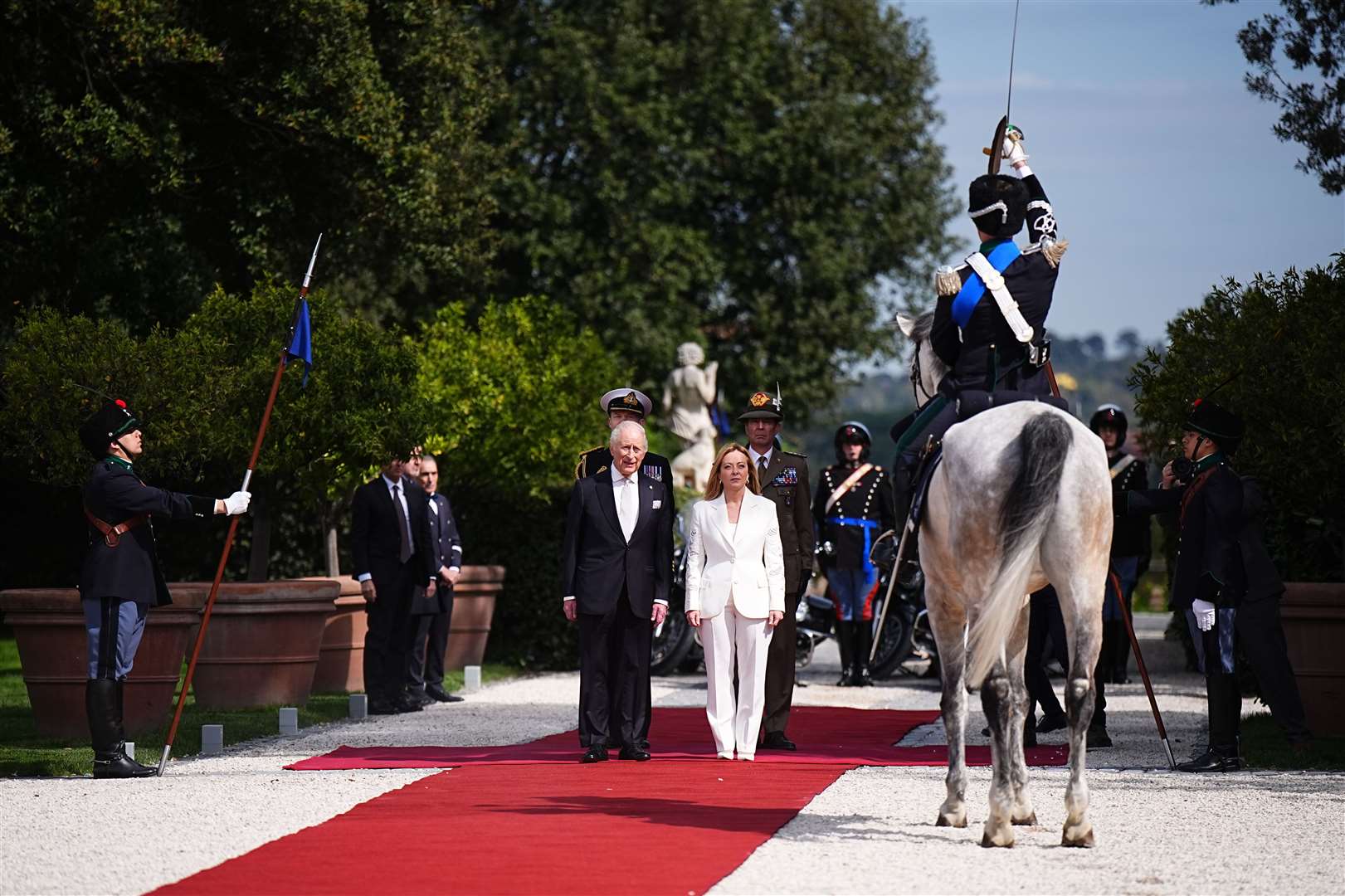 The King is welcomed by Italian Prime Minister Giorgia Meloni (Aaron Chown/PA)