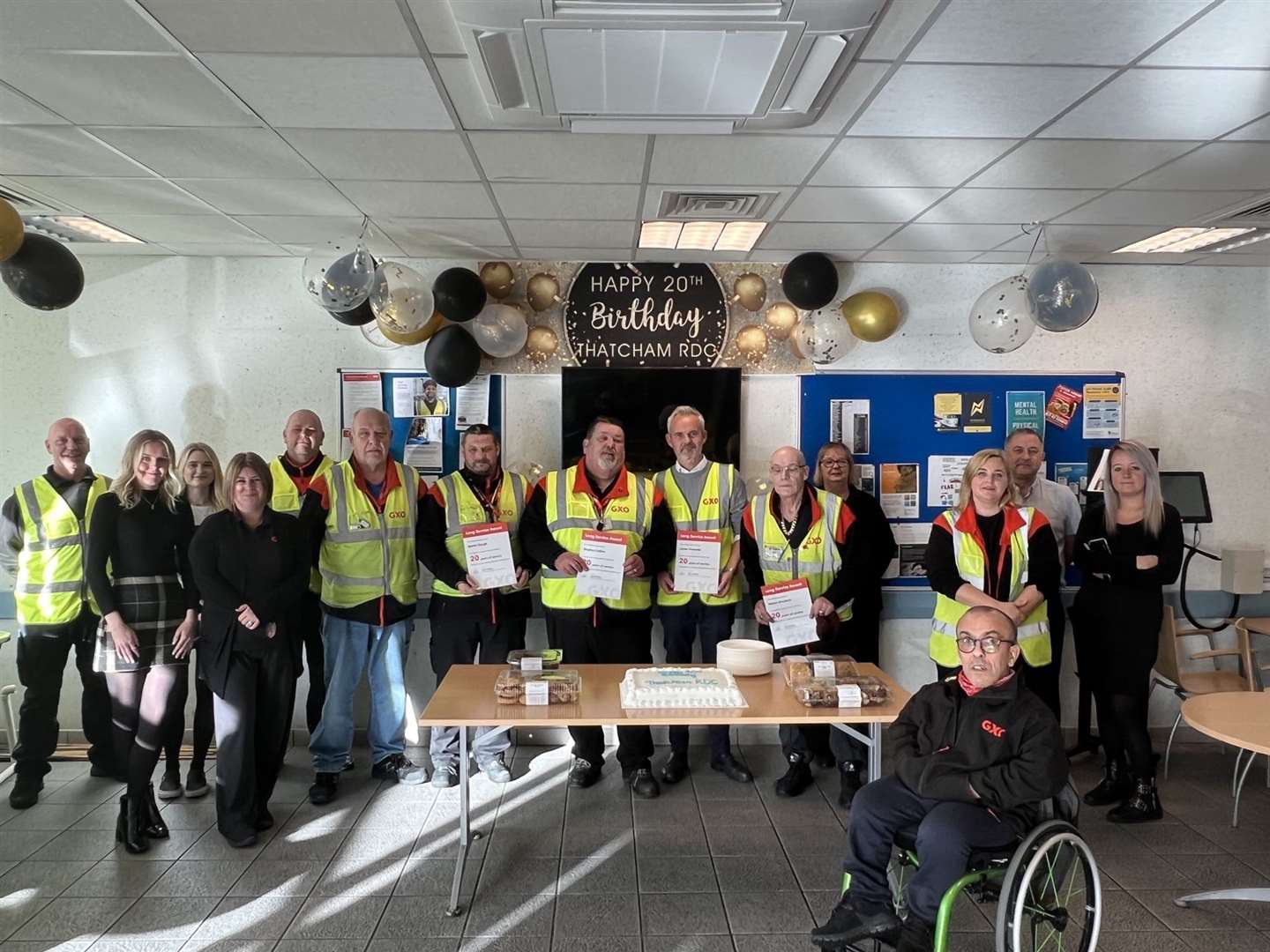 The team celebrating 20 years. Picture James Howarth