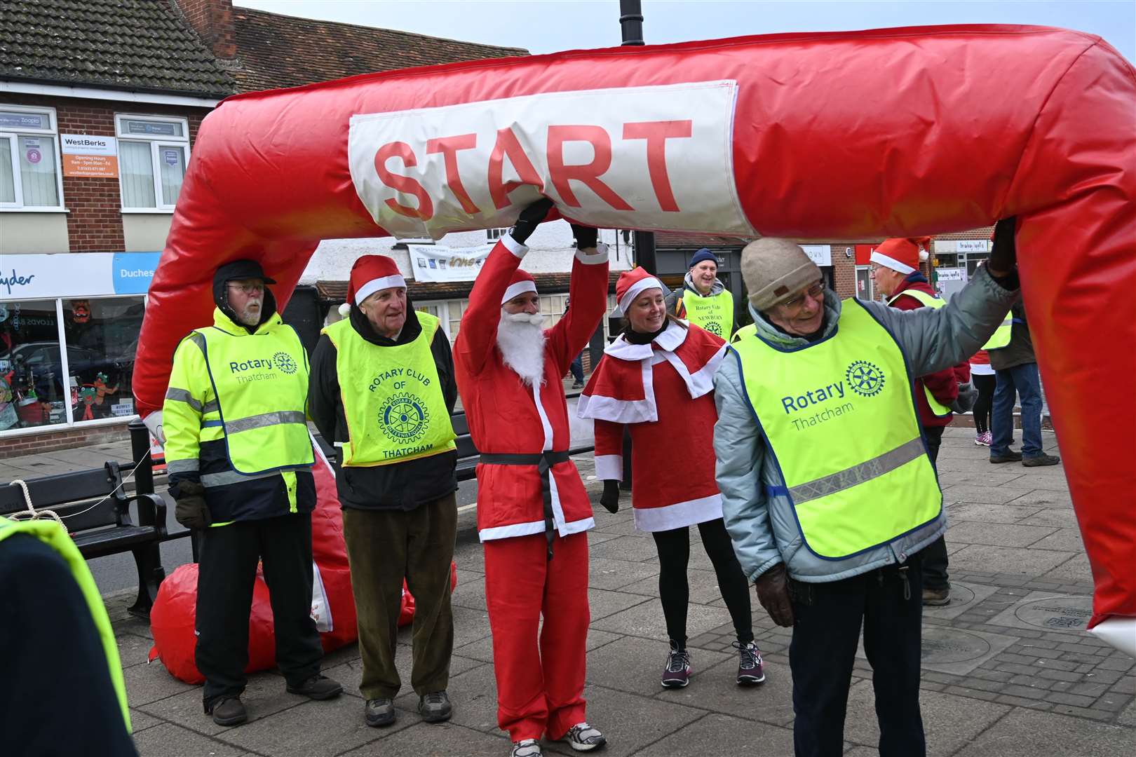 Thatcham Rotary at the starting line with some of the sporty Santa's.
