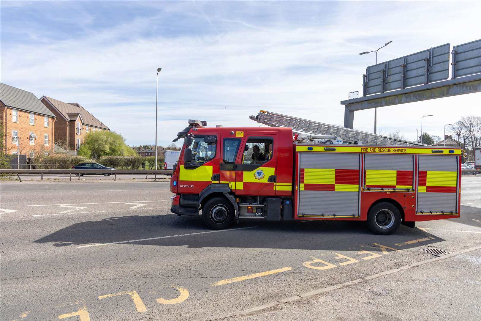Newbury fire crews head off to an emergency during the car wash