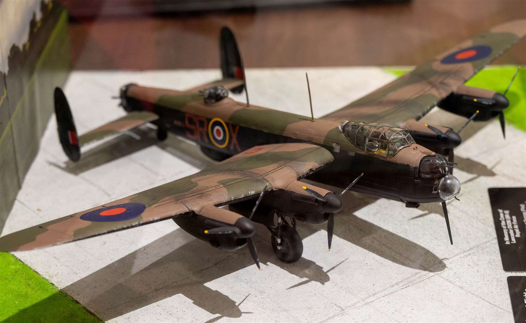 Model Lancaster bomber unveiled after the memorial service. Credit: USAF Staff Sgt Jessica Avallone