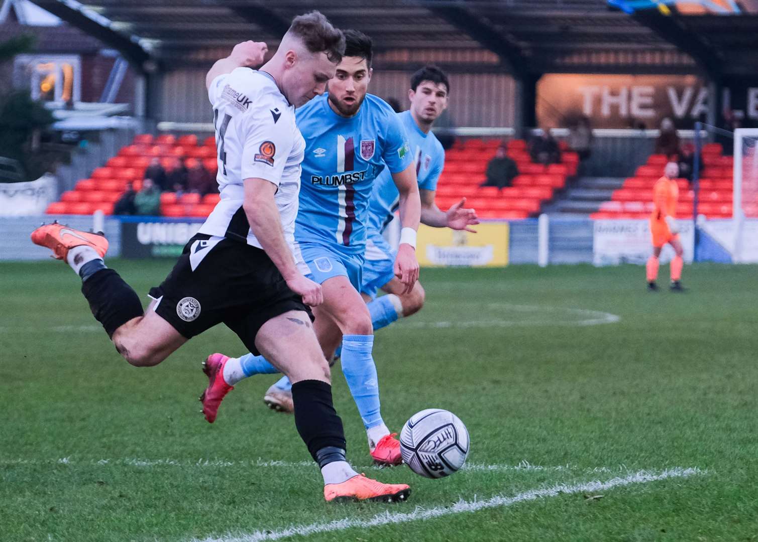 Jake Evans clears the ball from danger
