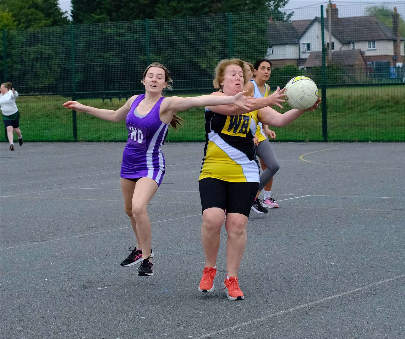 Hungerford Netball Team (purple) v DWH (yellow). (52374166)