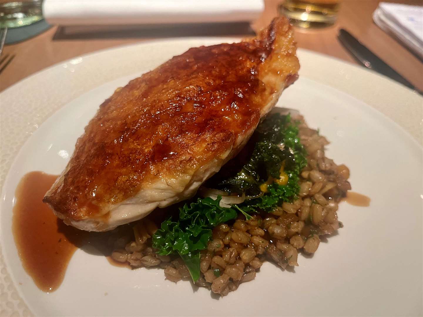 Guineafowl paired with pearl barley, barbecued swede and port wine sauce