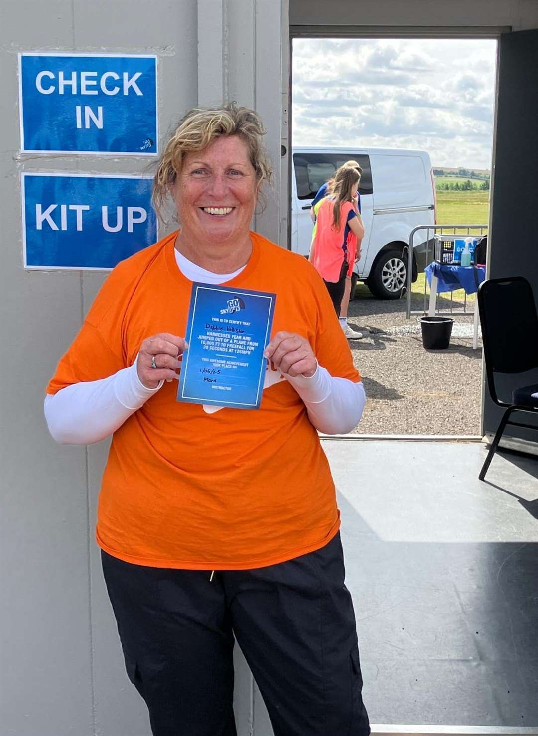 Debbie Hollister with her certificate
