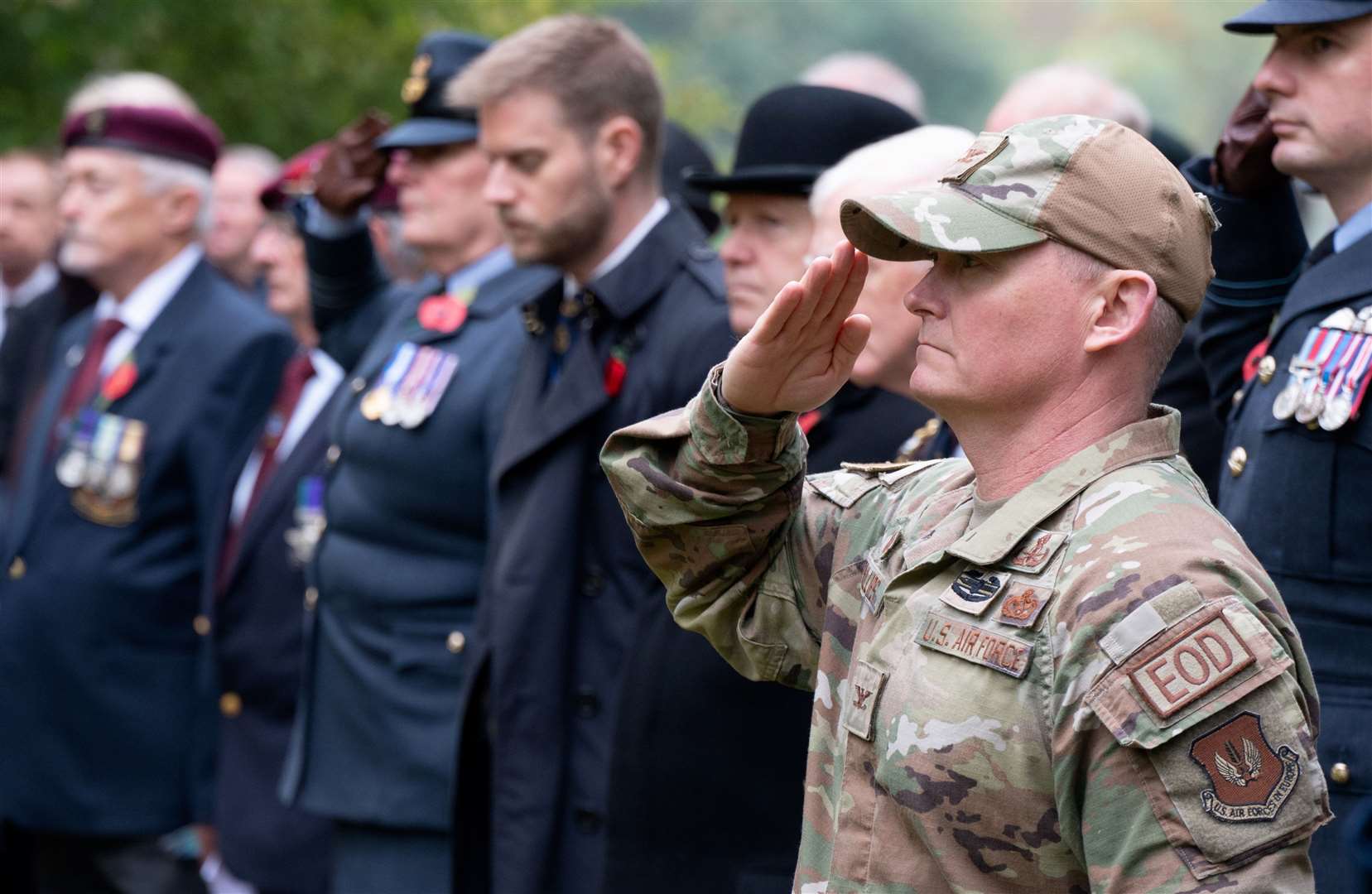 Service personnel pay their respects at RAF Welford Remembrance service. Credit: Adam Enbal / USAF
