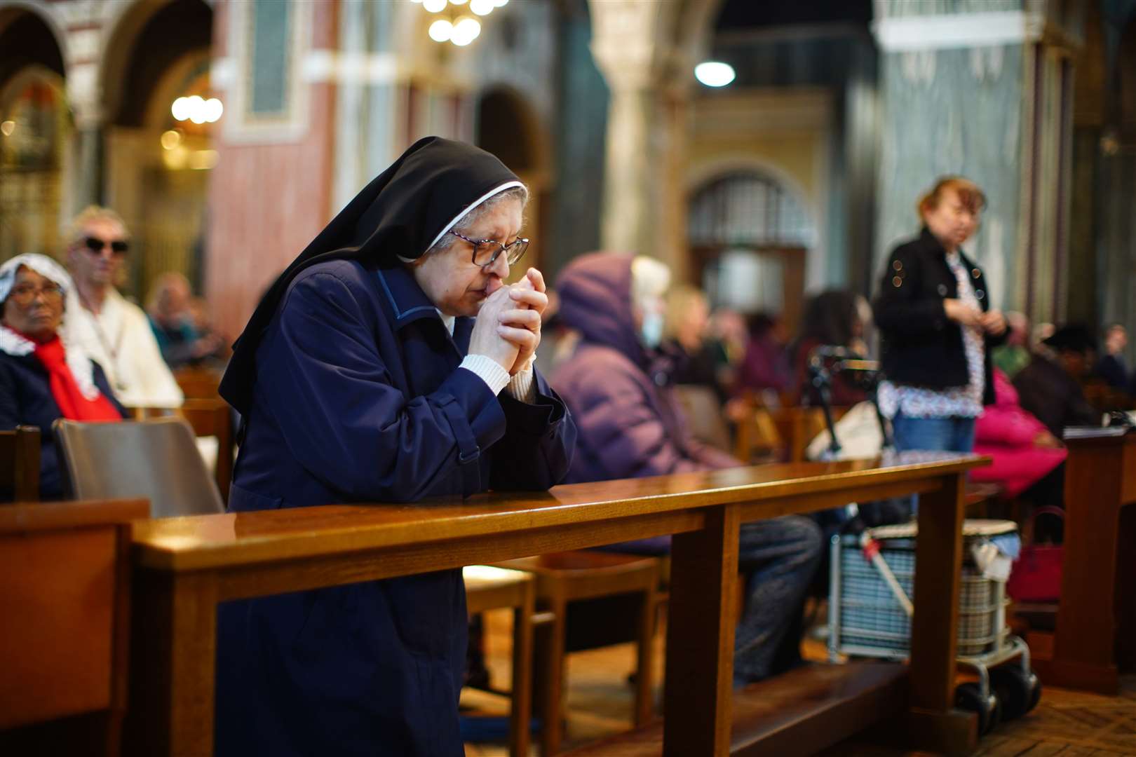 A nun prays in Westminster Cathedral (James Manning/PA Wire)