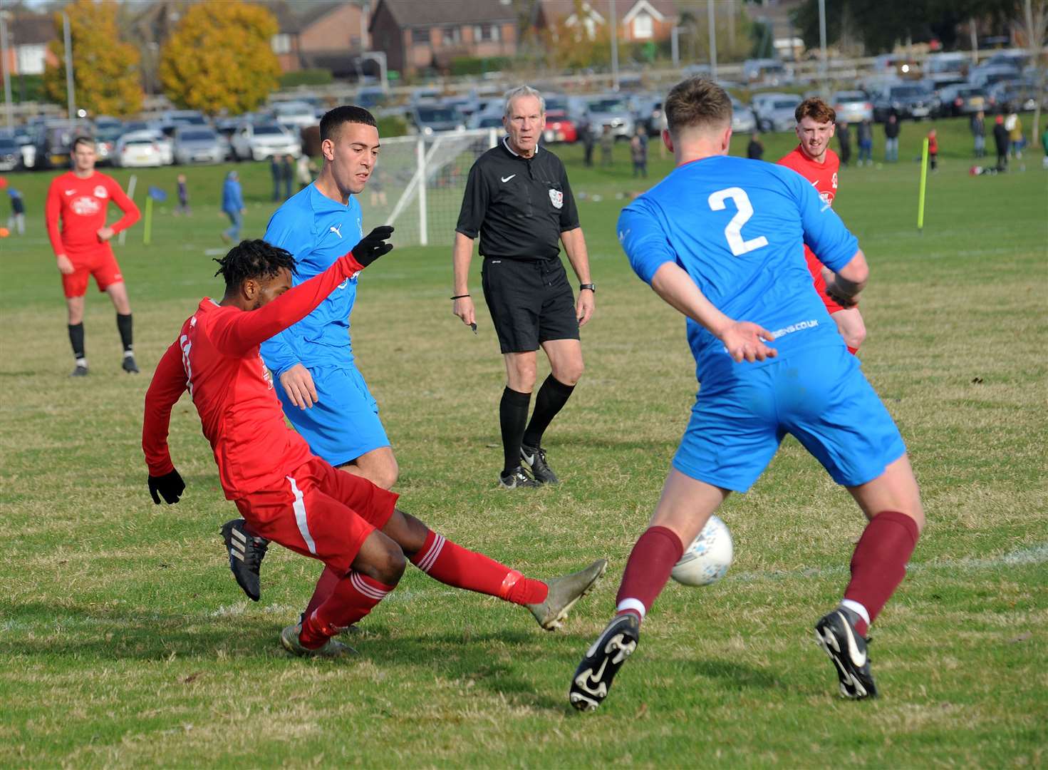 One of the Bucklebury players goes for goal