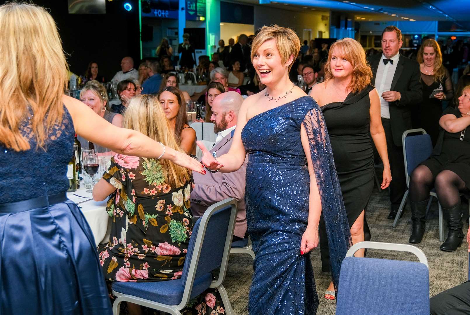 Heritage Estate Planning founder and managing director Alison Ilott approaching the stage to accept an award