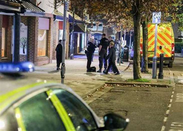 Police at the scene of the disorder in Thatcham town centre
