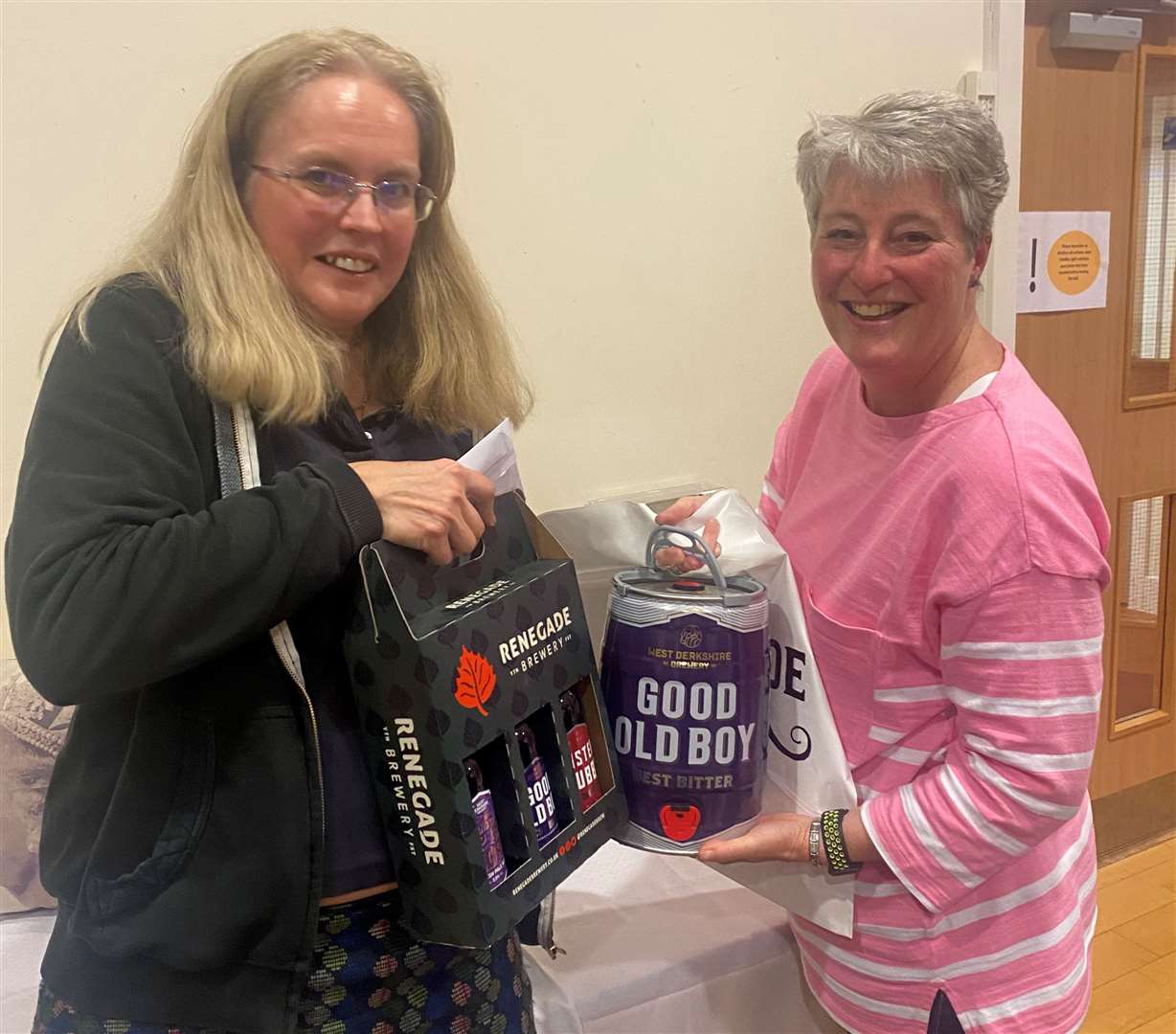 Sarah Beeson collecting her prizes from Stephanie Molloy