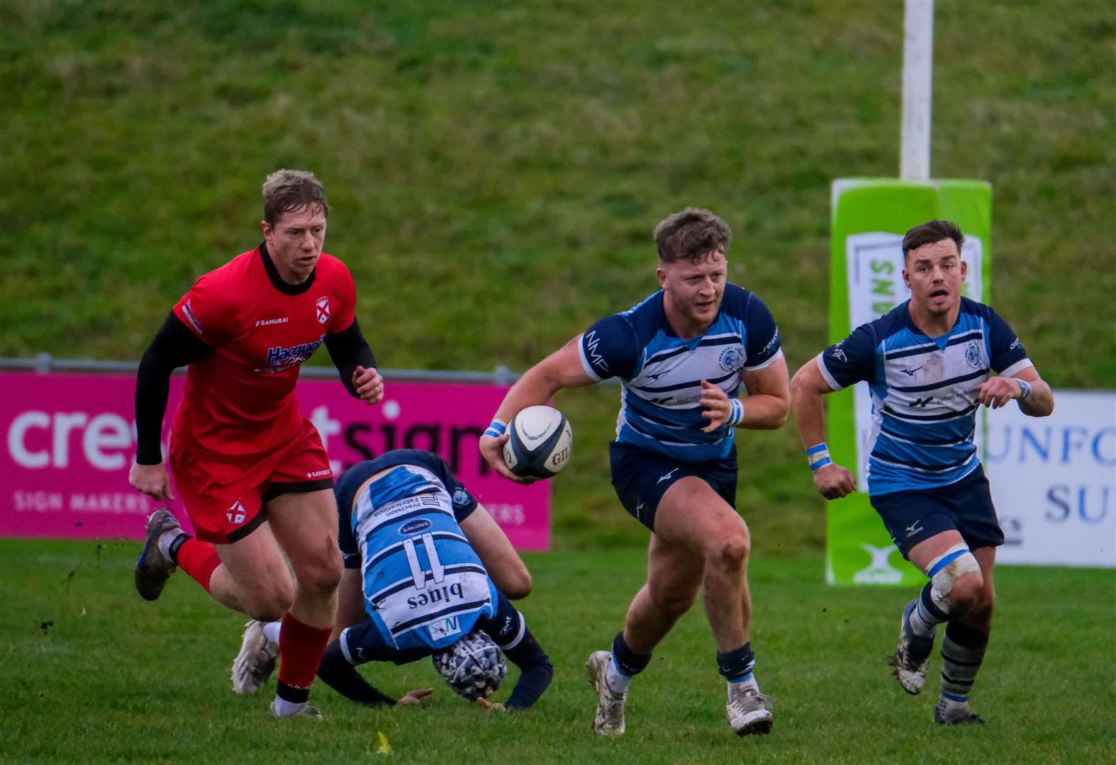 Ali Magee drives forward for Blues