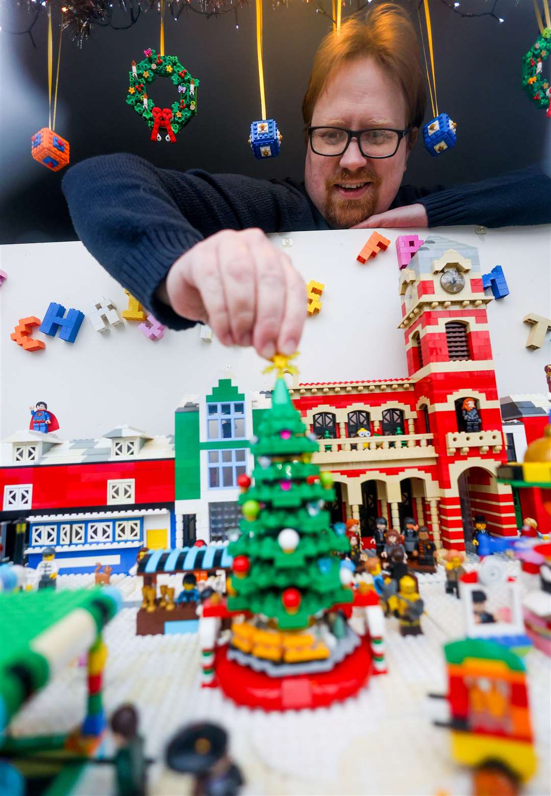 Martin James-Goodall has created a scene from the Hungerford Extravaganza out of Lego, which is now displayed in the Tutti Pole shop window