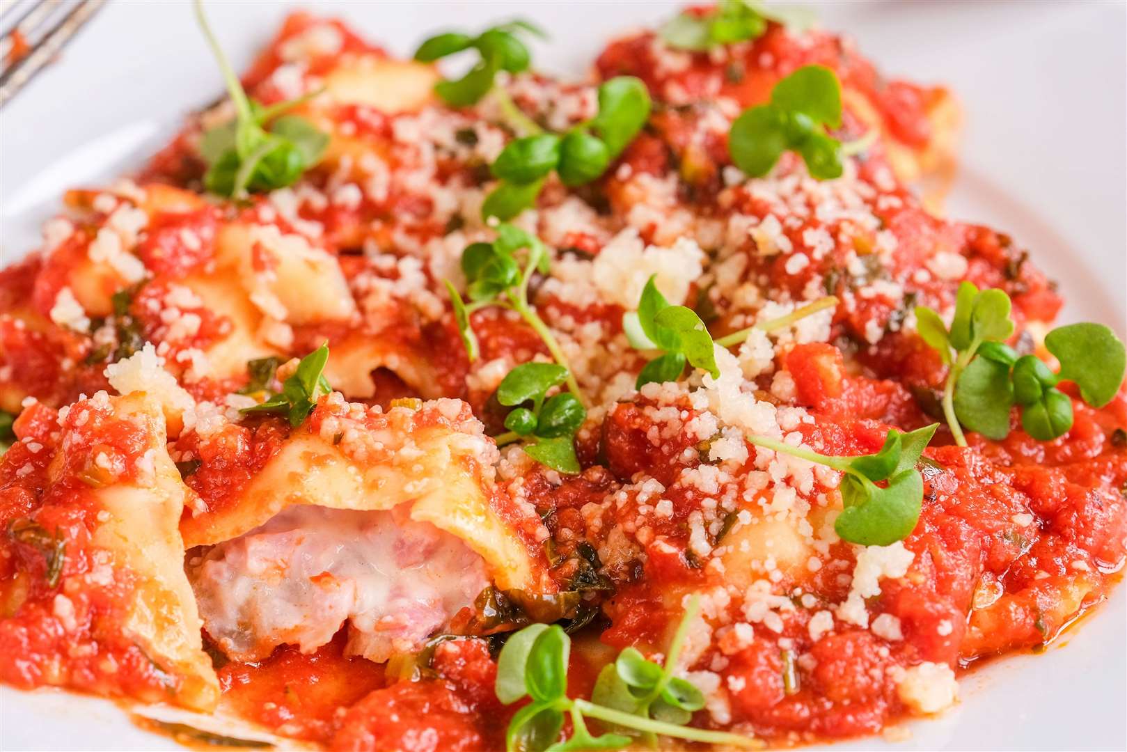White ravioli with Wiltshire ham and mozzarella in a tomato sauce with parmesan (£16)