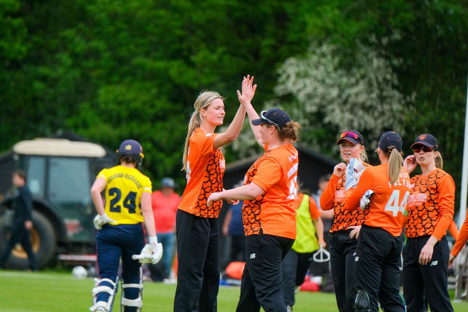 Bell celebrates her first wicket