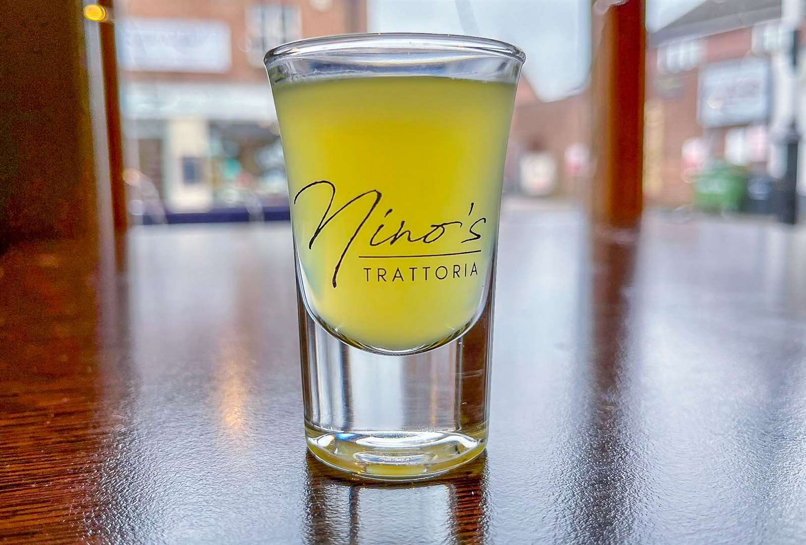 A shot of Limoncello, a lemon liqueur traditionally served chilled after dinner