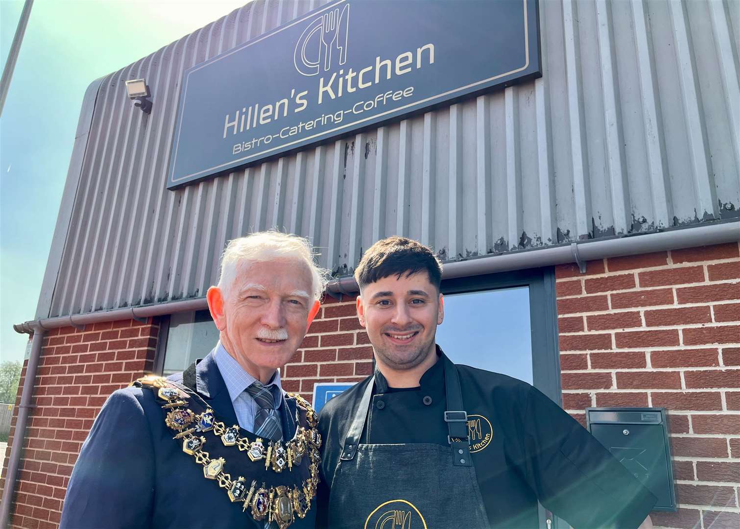 Sammy Hillen and Mayor of Newbury Andy Moore outside the new café which opened today (Friday)