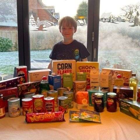 Percy with his haul of food and drink donations. Photo provided by the family