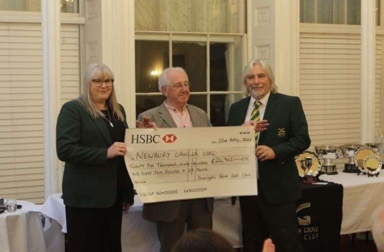 Dave Ormrod is presented with a cheque for £26,926.03