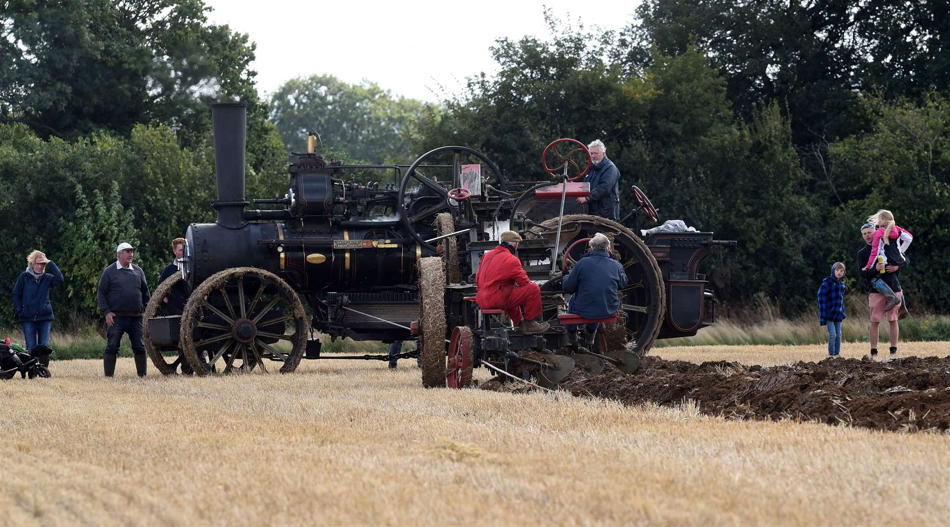 Driving an Ajax 1918 ploughing engine, with engine either end of the field with a plough pulled between them.
