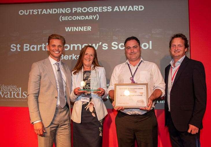 Headteacher Julia Mortimer with co-headteacher David Fitter picked up the award in London from Jeff Brazier