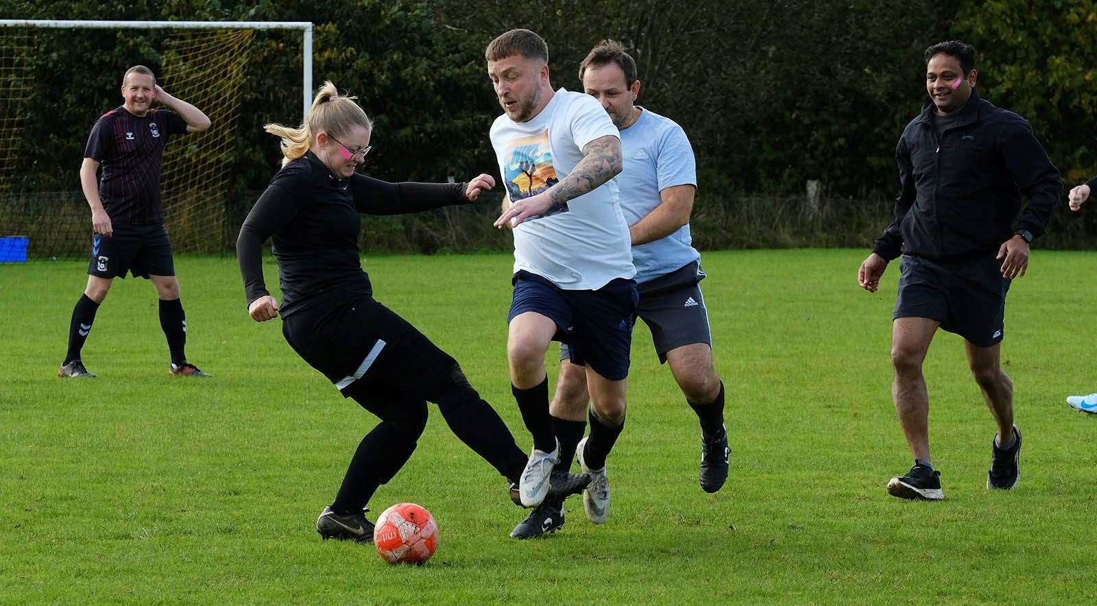 Parents brave 11-a-side for charity