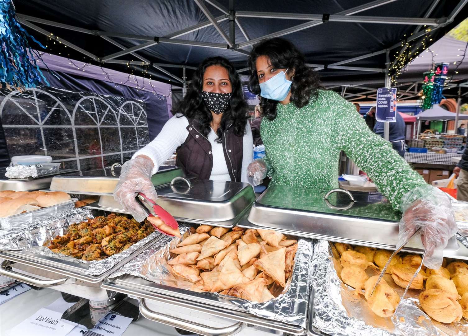 Hindu Swayamsevak Sangh UK at Newbury Market raising funds to help India flatten the curve. .Anjali Joshi and Anupama Kamath.Ref: 21-0921E..Picture by Phil Cannings. (47463040)