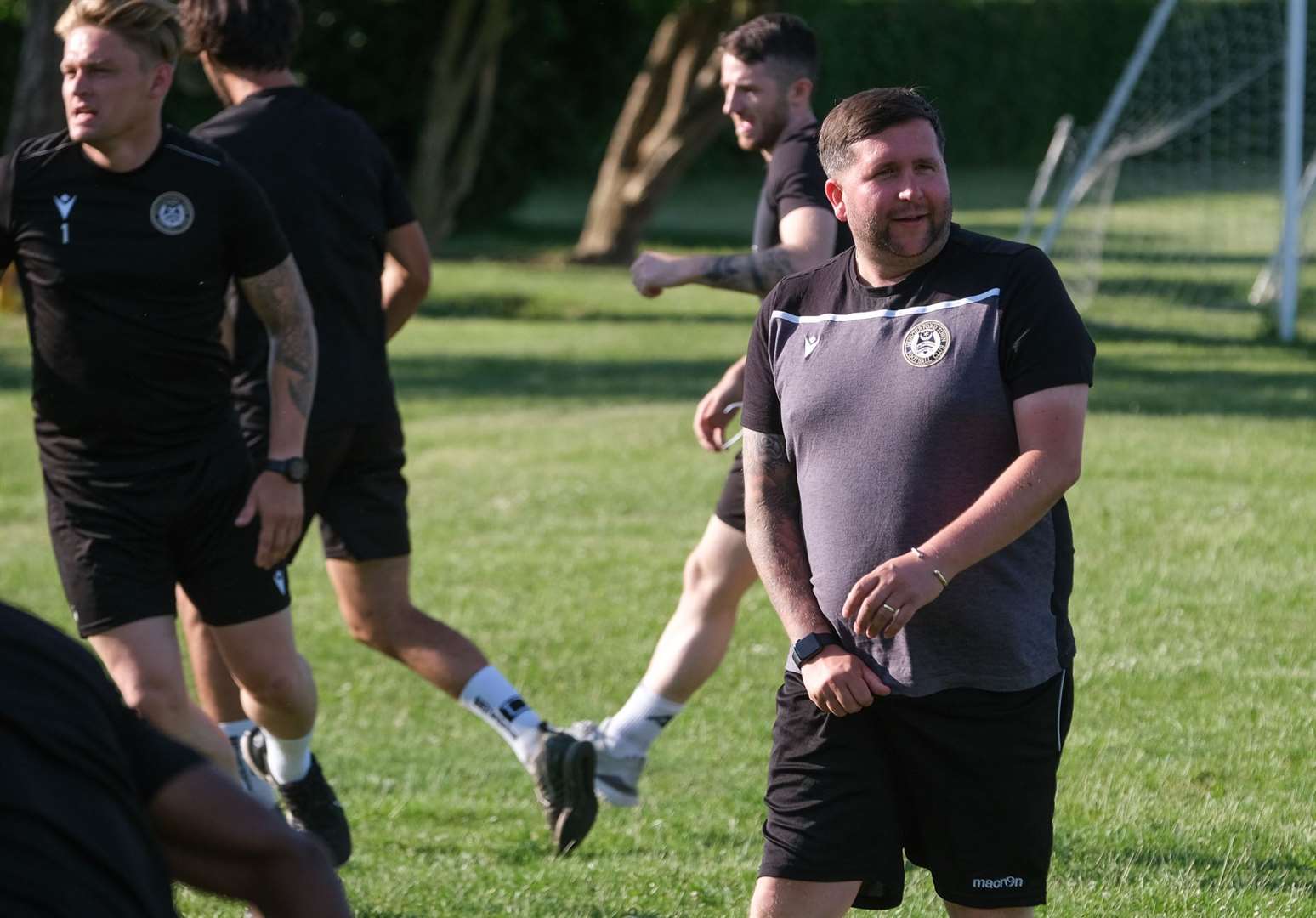 Danny Robinson watches on in training