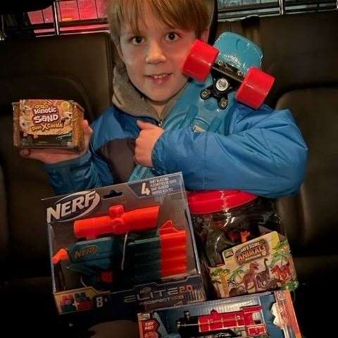 Sam helped spread Christmas joy with his toy donations. Photo provided by the family