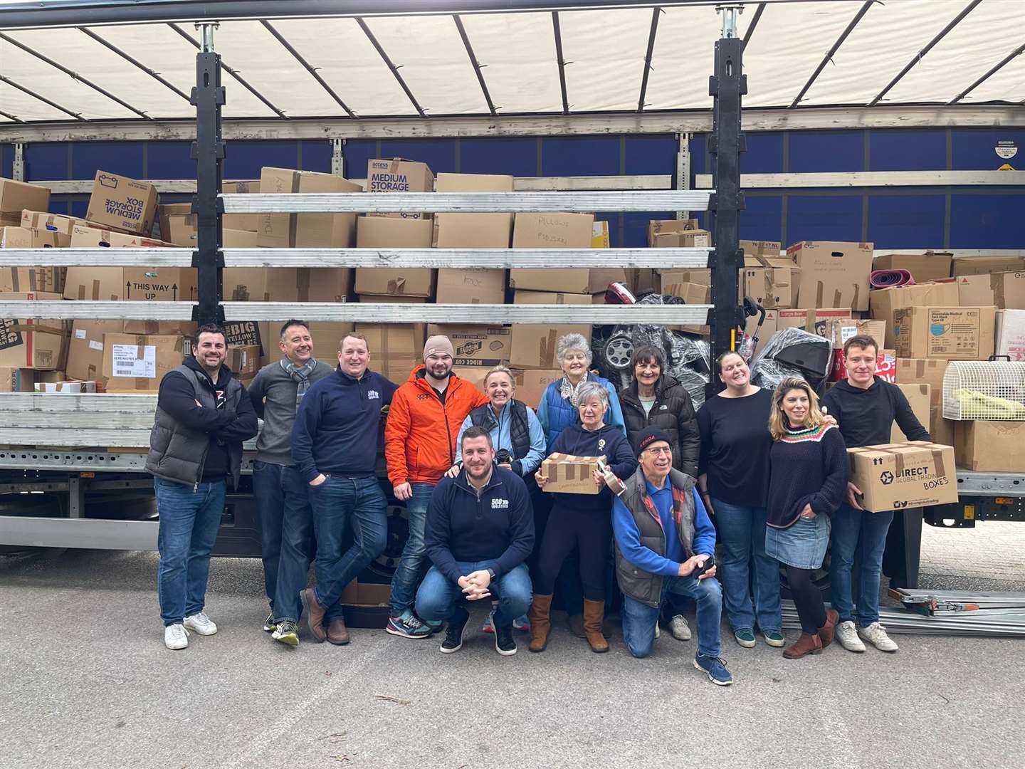 Steve Dinsey with the volunteers after the van was loaded on March 9. Picture by: 500 Logistics