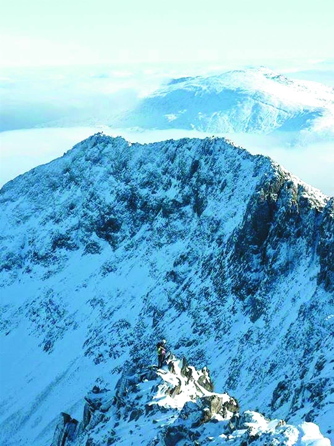 Winter ascent of Crib Goch Ridge in Snowdonia