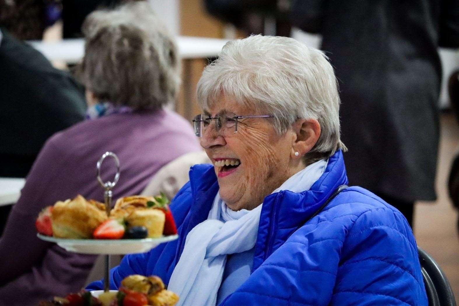 Guests enjoying treats specially made by school pupils