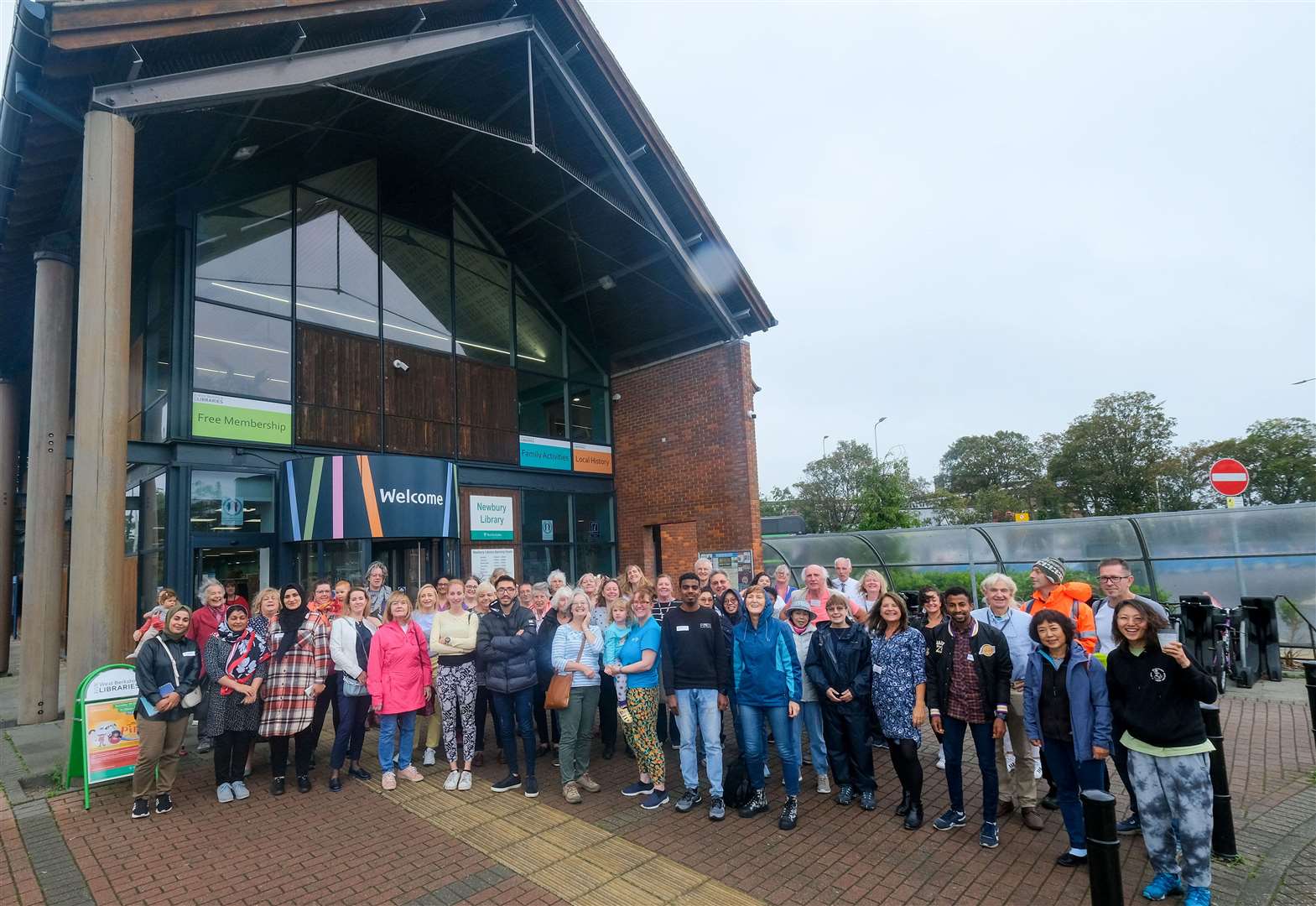 Educafé visitors and volunteers gather outside Newbury Library