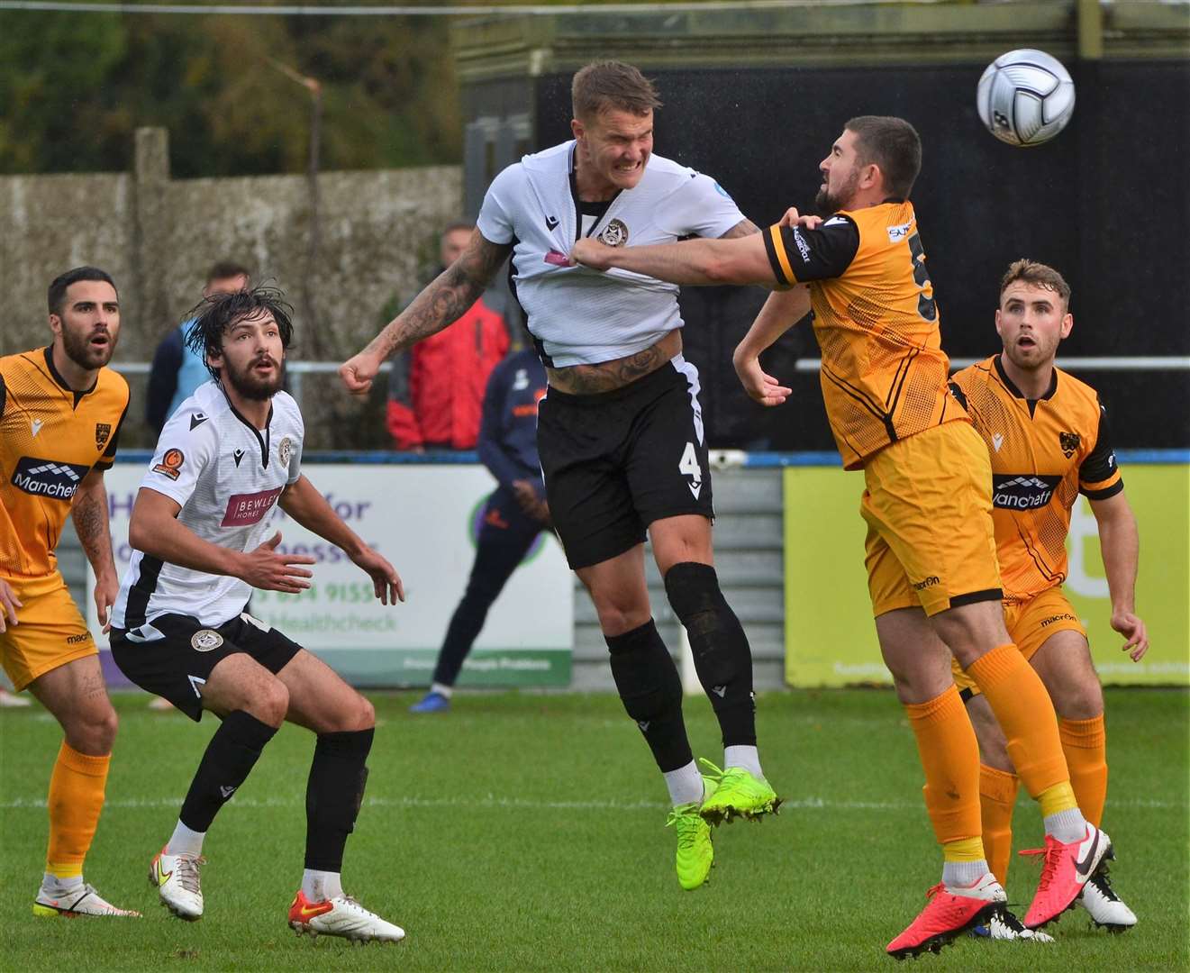 Matt Partridge wins a powerful header against Maidstone