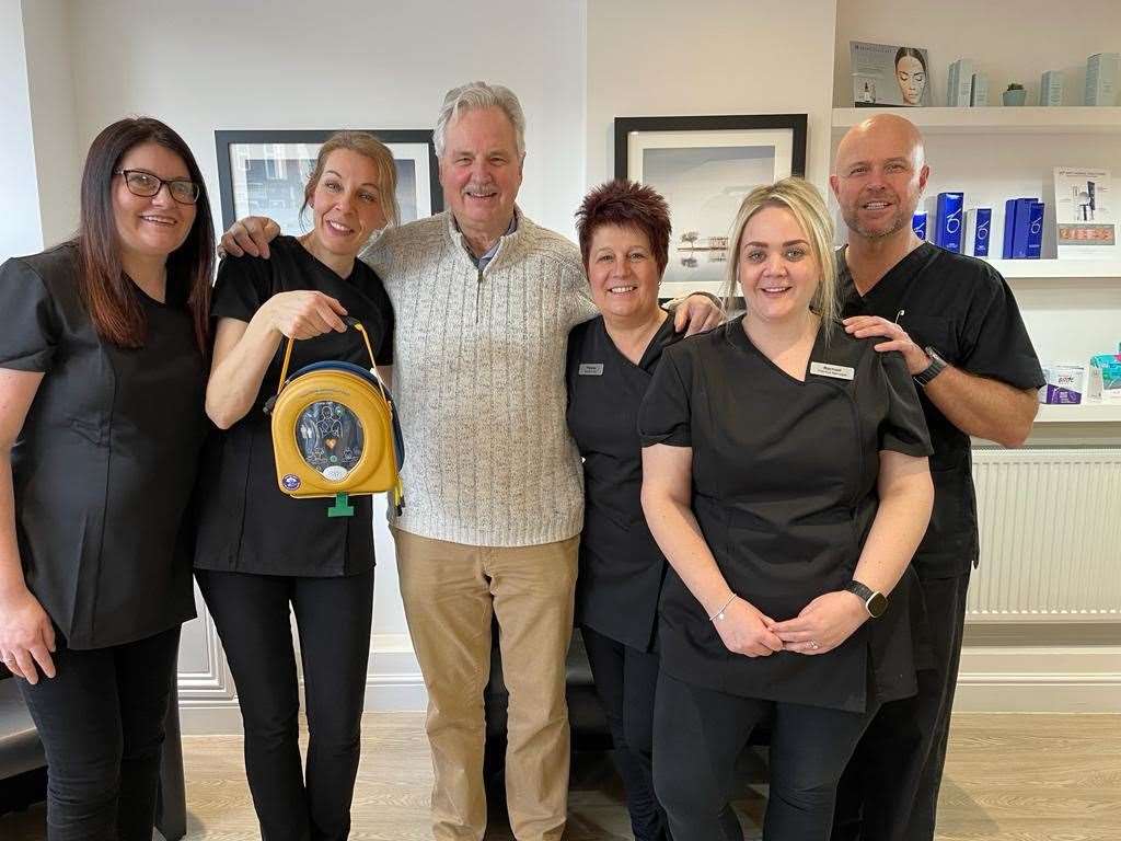 Andy How (centre) thanks staff at Smile Studio - from left to right, Laura Annettes, Tia Dunne, Theresa Merritt, Rachael Curtis and Charl du Toit