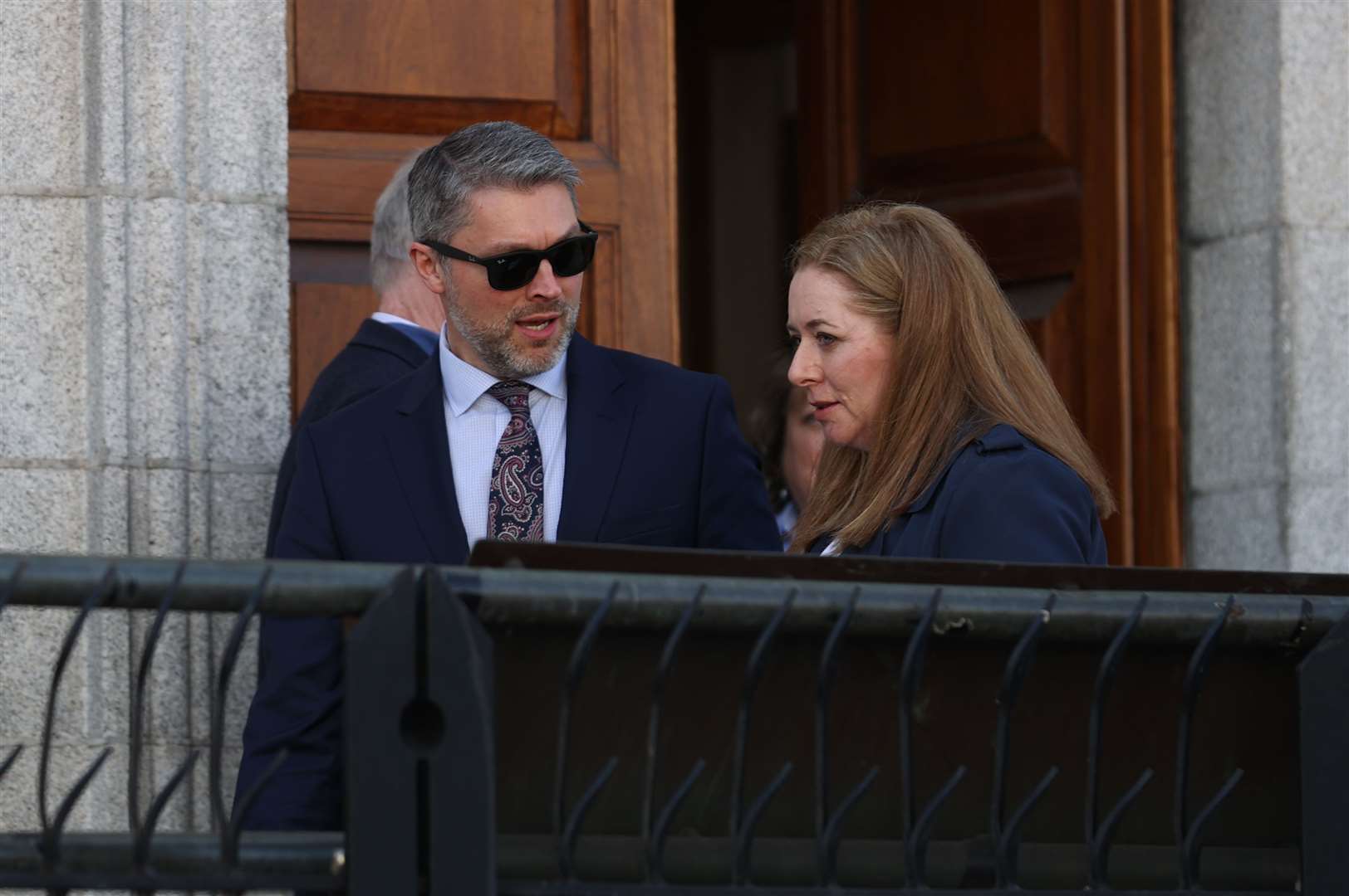 Adam Smyth, director for BBC Northern Ireland, and reporter Jennifer O’Leary, outside the High Court in Dublin (Liam McBurney/PA)