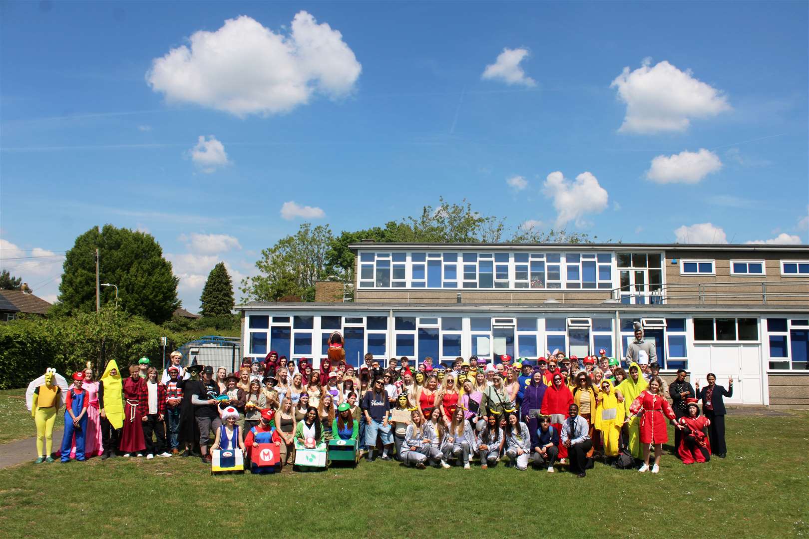 Year 13 students gather for their last group shot outside the school